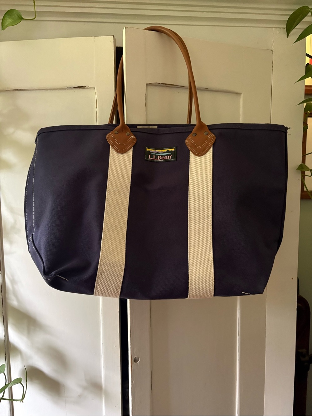 L.L. Bean Navy Duffel with Cream Webbing and Tan Leather Handles